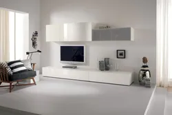 Белый телевизор в интерьере гостиной