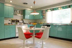 What color goes with mint in the kitchen interior photo
