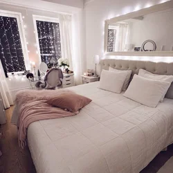 Bedroom with high bed photo