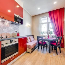 Kitchen design with red sofa