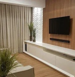 Living room with hanging TV stand photo