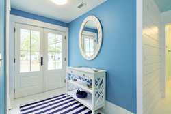 Hallway interior with blue wallpaper