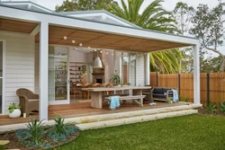 Summer kitchen attached to the house photo