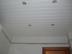 Ceiling made of aluminum panels in the bathroom photo