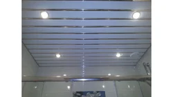 Ceiling made of aluminum panels in the bathroom photo