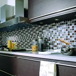 White mosaic tiles in the kitchen apron photo