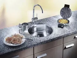Round sink in the kitchen interior