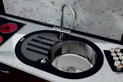 Round sink in the kitchen interior