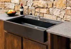 Countertop sink in the kitchen photo