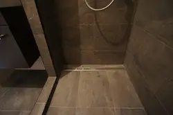 Душевой трап в ванной фото