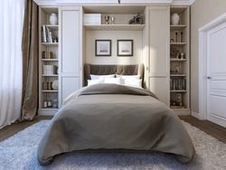 Wardrobe around the bed in the bedroom design