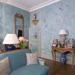 Wallpaper with birds in the living room interior