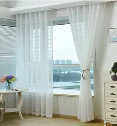 Curtains without tulle in the bedroom interior