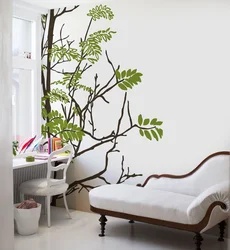 Leaves on the wall in the bedroom interior