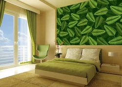 Leaves on the wall in the bedroom interior