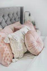 Decorative pillows in the bedroom interior