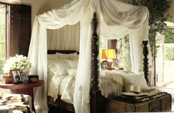 Photo of a bedroom with a canopy