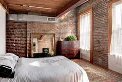 Bedroom design with wood and brick