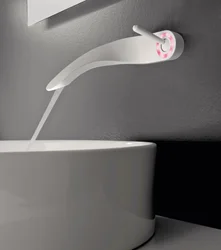 White faucet in the bathroom photo