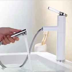 White faucet in the bathroom photo