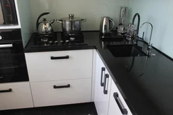 Kitchen design with black faucet