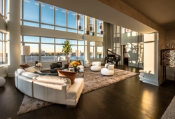 Living room interior with a large window in the apartment