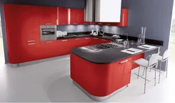 Gray wallpaper and red kitchen interior