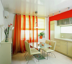 Kitchen design with orange curtains