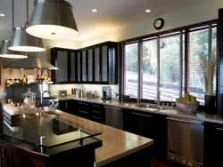 Black windows in the kitchen interior photo