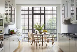 Black windows in the kitchen interior photo
