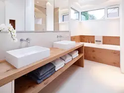 Bathtubs with wooden countertop photo