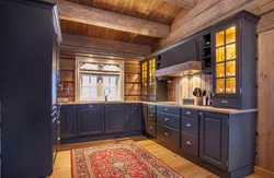 Interior with gray kitchen in a wooden house