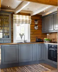 Interior with gray kitchen in a wooden house