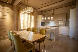 Interior with gray kitchen in a wooden house