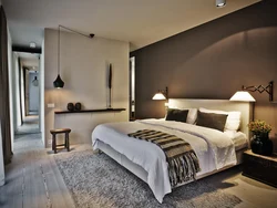 Lamps on the wall in the bedroom in the interior photo