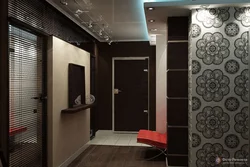 Photo of the hallway in an apartment with dark doors