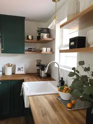 Emerald kitchen with wood photo
