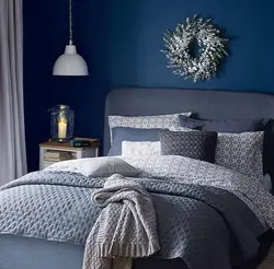 Bedroom design in gray and blue tones