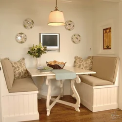 Kitchen interior with chair and bed
