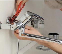 Change Bathroom Faucet Photo