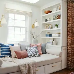 Sofa by the window in the bedroom design