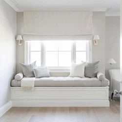 Sofa by the window in the bedroom design