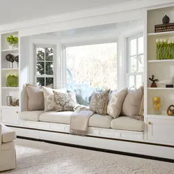 Sofa by the window in the bedroom design