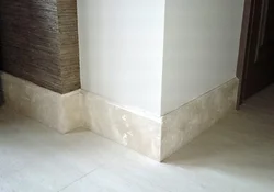 Plinth on tiles on kitchen floor photo