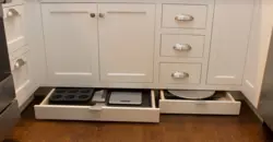 Photo of a kitchen with drawers below