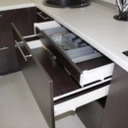 Photo of a kitchen with drawers below