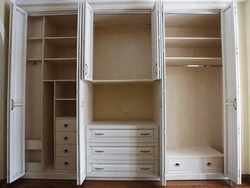 Wardrobes with hinged doors to the bedroom contents photo