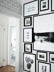Frames with photos on the wall in the hallway