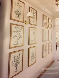 Frames With Photos On The Wall In The Hallway