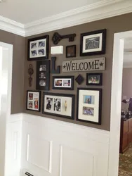 Frames With Photos On The Wall In The Hallway